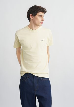 IN BLOOM - Μπλουζάκι με στάμπα - pale yellow