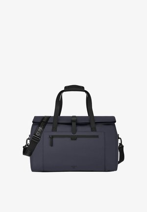 Bolsa de lona azul marino con asas negras, bolsillo frontal con cremallera y correa de hombro ajustable con la marca "Cerruti 1881".