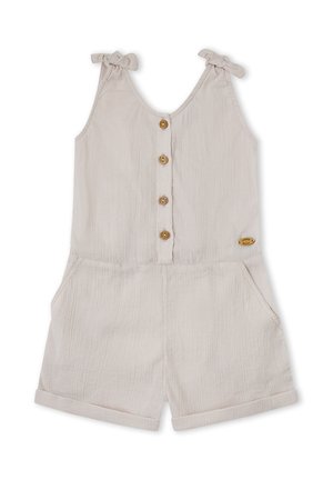 Mono sin mangas de color beige claro con tirantes anudados en los hombros, botones de madera en la parte delantera, bolsillos y shorts con bajo enrollado.