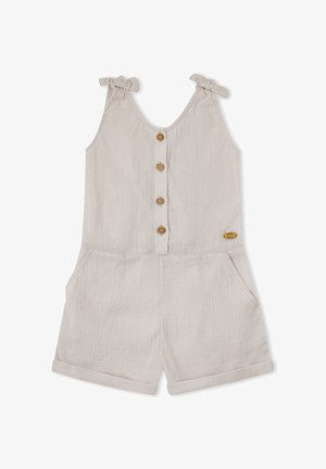 Mono sin mangas de color beige claro con tirantes anudados en los hombros, botones de madera en la parte delantera, bolsillos y shorts con bajo enrollado.