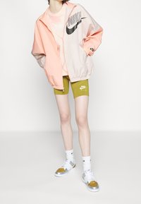 Nike Sportswear Větrovka - orange