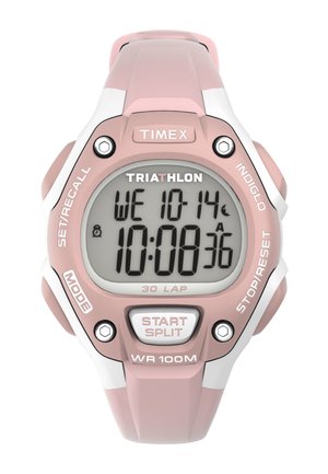 Reloj deportivo digital con correa de silicona rosa y acentos blancos. Cuenta con una gran pantalla gris, temporizador y múltiples botones de función.