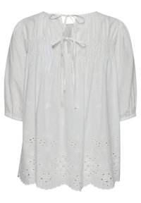 Blouse en coton blanc avec des manches trois-quarts, un col froncé et des broderies décoratives. Présente un ourlet en forme de feston et une fermeture à nouer au dos.