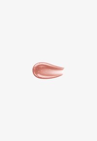 Tache de crème cosmétique rose-beige scintillante avec une texture brillante sur fond blanc.