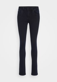 Tmavě modré džínové kalhoty s úzkým střihem, klasickým pětiokým designem a jemnými detaily v prošití. Tkanina má hladkou strukturu.