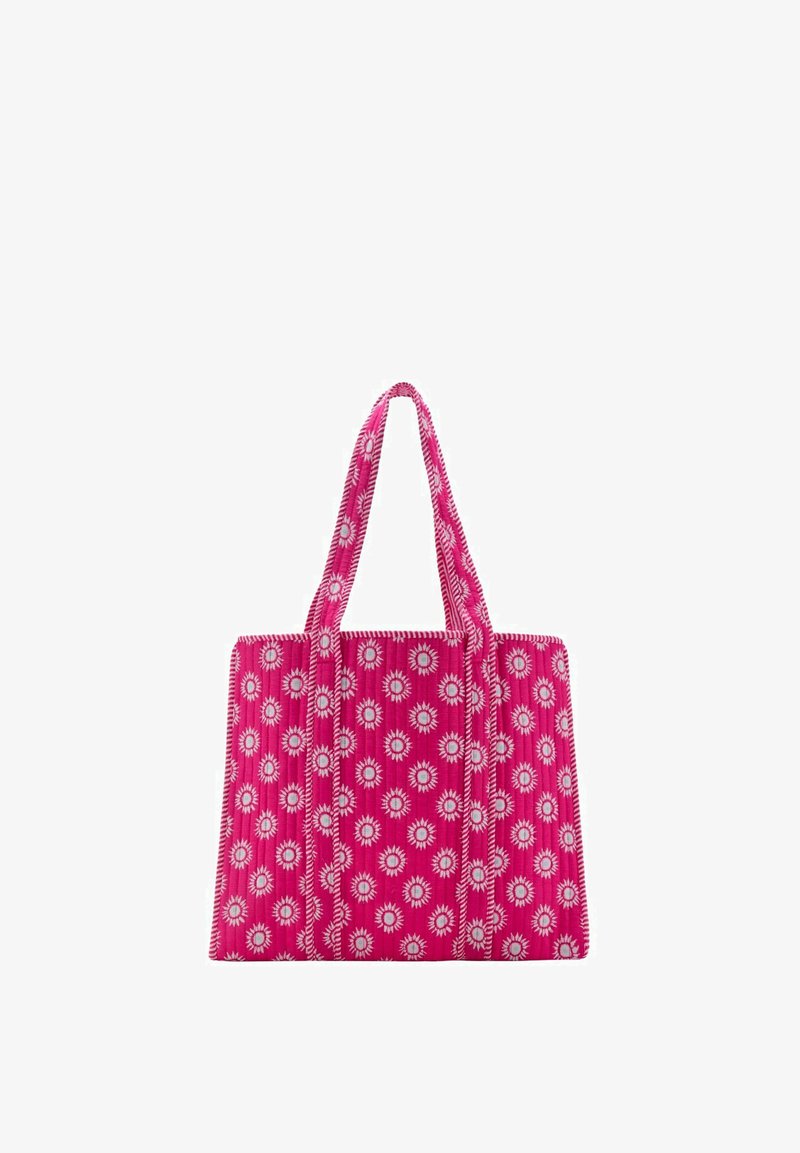Ružová taška cez rameno s bielymi vzormi pripomínajúcimi slnečné lúče a dvoma dlhými uchami, vyrobená z prešívanej látky.