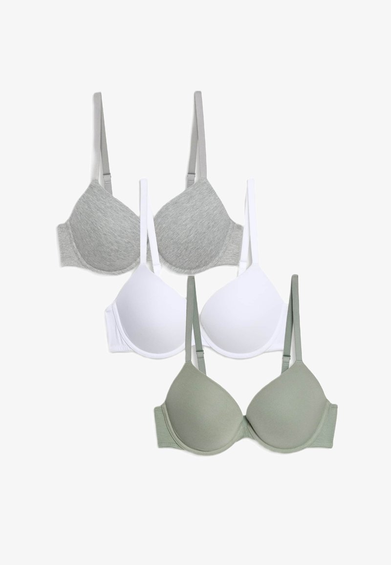 Tres sujetadores: uno gris, uno blanco y uno verde oliva. Cada uno tiene un acabado suave, copas acolchadas, tirantes ajustables y un corte clásico.
