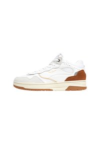 White athletic sneaker with suede accents, perforated details, and a gum rubber outsole. Features a lace-up design and branding in gold.