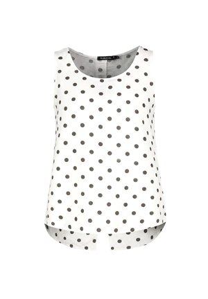 White sleeveless blouse with black polka dots, round neckline, and slightly longer back with a small center slit.