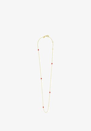 Collier en chaîne dorée avec de petits accents ronds rouges, au design délicat et avec un fermoir réglable. Longueur adaptée pour le superposition ou pour être porté seul.