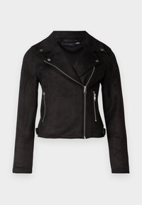 Černá nubuková motocyklová bunda s cropped designem, asymetrickým zipem a stříbrnými kovovými doplňky. Obsahuje cvokové knoflíky a boční kapsy.