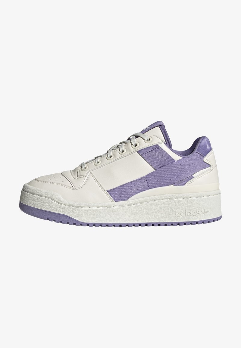 White sneaker with lavender accents, featuring a smooth leather upper, canvas overlays, and a textured rubber sole. Lace-up design.