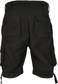 Shorts cargo noirs avec plusieurs poches à rabat et des liens ajustables à l'ourlet, vus de dos.