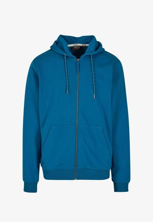 Kék cipzáras kapucnis pulóver, puha anyagból készült, függő zsinóros kapuccsal, két elülső zsebével és bordázott mandzsettákkal.