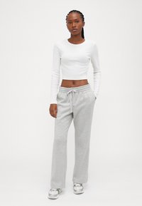 GAP Petite HERITAGE - Treniņtērpa apakšdaļas - light heather grey