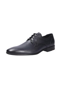 Chaussures habillées en cuir noir avec une surface lisse, un bout pointu, un design à lacets et un minimalisme dans les détails. Semelle en caoutchouc plate avec un léger talon.