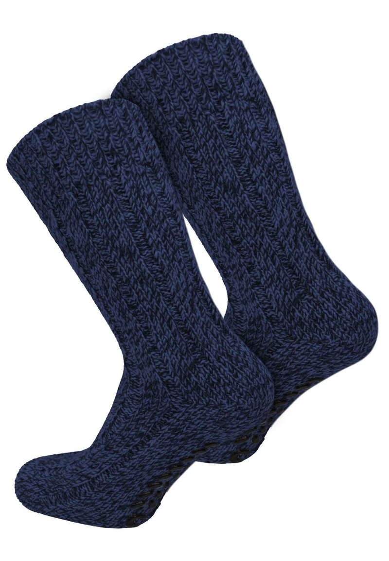 Marineblaue gestrickte Socken mit einem gerippten Muster, strukturiertem Stoff und einer gepolsterten Sohle für zusätzlichen Komfort.