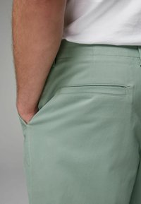 Next EDIT UTILITY RELAXED FIT - Chino stiliaus kelnės - seafoam green