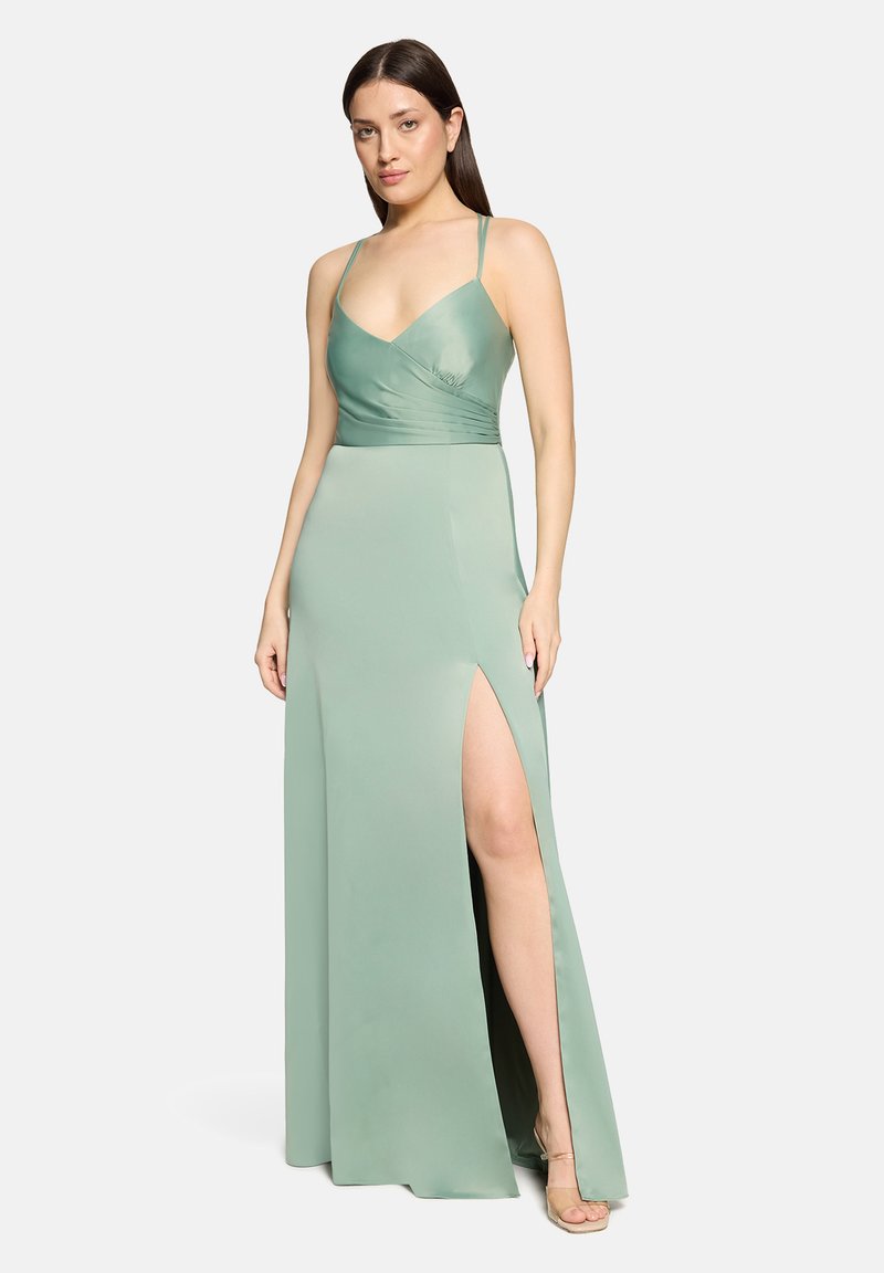 Satynowa zielona sukienka z dekoltem w serek, cienkimi ramiączkami i bocznym rozcięciem. Posiada dopasowany gorset i gładką teksturę, idealna na oficjalne okazje.