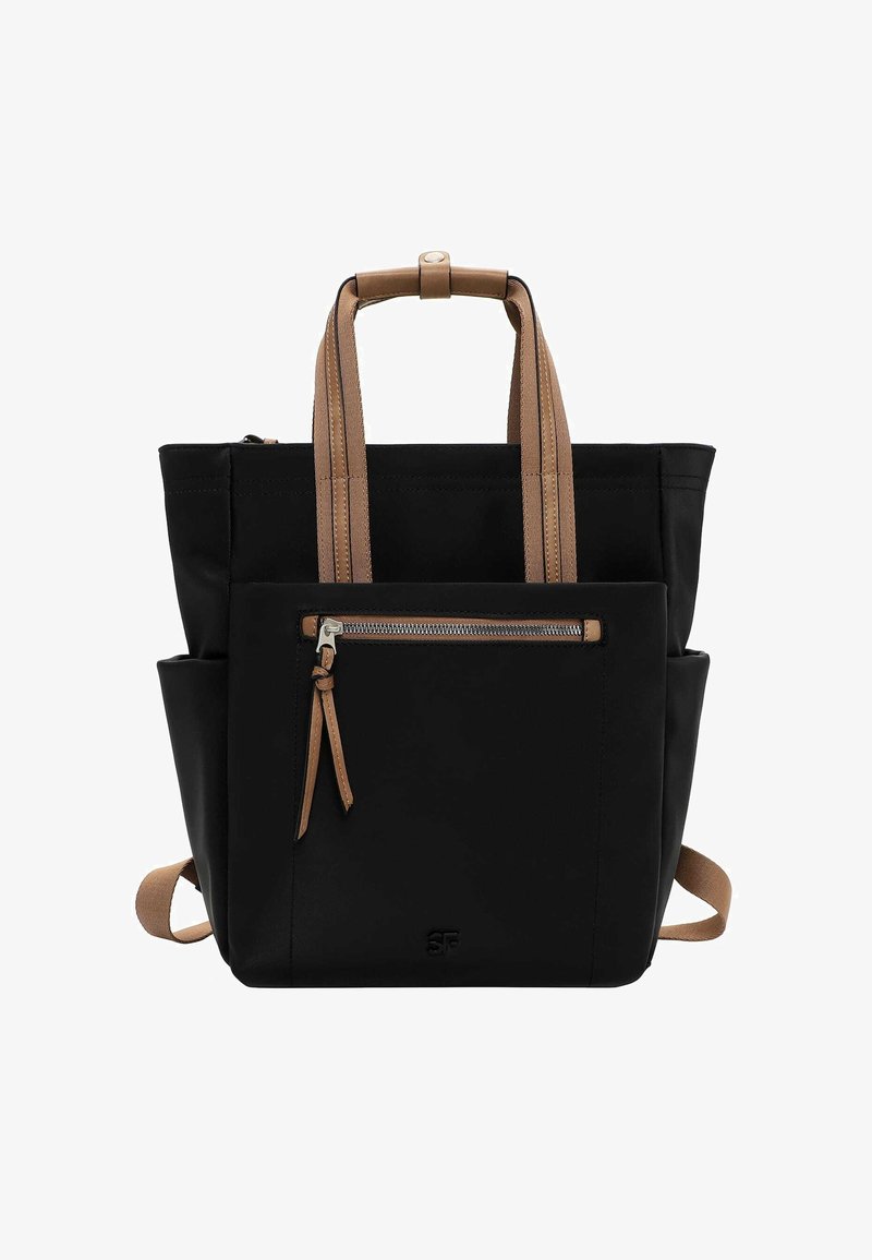 Black backpack with brown handles and zipper pulls, front zip pocket, side pockets, and top snap closure.