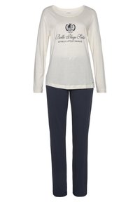 Top de manga larga color beige claro con texto gráfico en navy, combinado con pantalones navy oscuros. Tejido suave, corte relajado y diseño sencillo.