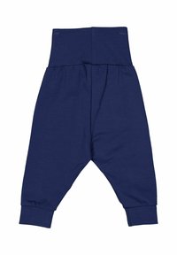 Pantalons en coton bleu marine avec une large taille, des jambes effilées et des poignets côtelés ; présente une coupe décontractée avec des détails froncés à la taille.