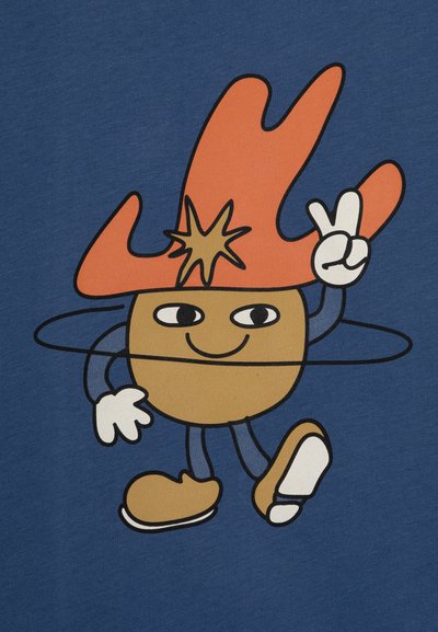 Multifunktsionaalne joonistus tegelaskuju sinisel kangal, millel on pruun ümmargune keha, oranž müts, millel on täht, sinised jäsemed ja valged jalanõud, poseerides rahu märgi käega.