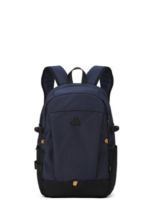 Navy blue backpack with black base, fabric material, padded shoulder straps, front zipper pocket, and a logo on the front.