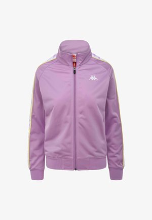 Giacca da track viola realizzata in tessuto liscio, con colletto alto, zip frontale e strisce laterali con motivo a contrasto. Logo sul petto.