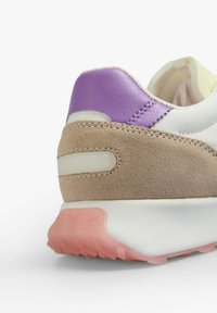 Sneaker with a white leather body, beige suede accents, purple leather heel detail, and a pink rubber sole. Stitching is visible on seams.