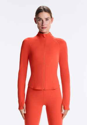 OYSHO LIGHT WARMTH COMFORTLUX TECHNICAL JACKET. - Veste de running - mottled orange