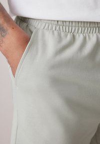 Next 2 PACK  - Pantaloni de trening - stone orange