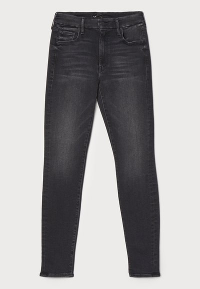 Sorte denim skinny jeans med en glat tekstur, der har fem lommer, lynlåslukning og subtile falmende områder langs lårene.