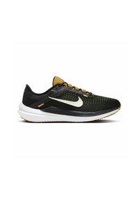Black and yellow running shoe with white sole, mesh upper, black laces, and a beige Nike swoosh on the side.