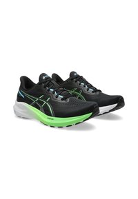 Scarpe da ginnastica nere con tomaia in rete, dotate di accenti verdi e blu, suola ammortizzata e un motivo di battistrada testurizzato.