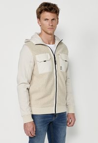 Koroshi Jachetă din fleece - beige