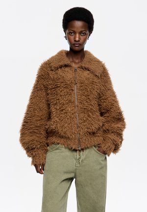 Chaqueta de punto - tofe