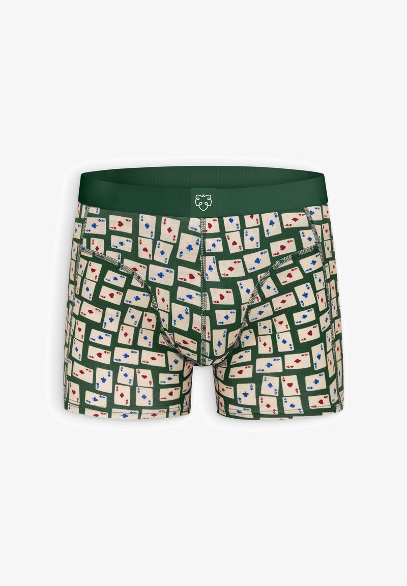Men's boxer briefs with dark green waistband and pattern of scattered playing cards featuring red and blue suits on a green background.