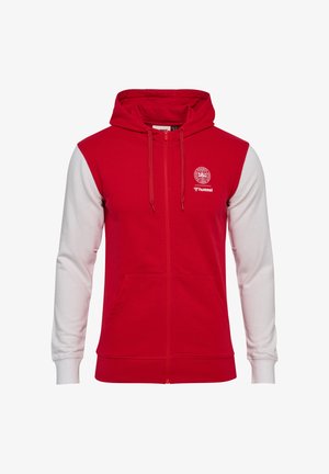 Czerwona bluza z kapturem na zamek błyskawiczny, białe rękawy, przednie kieszenie, kaptur ze sznurkiem oraz białe logo DBU i hummel na lewej piersi.