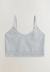 Heledashall hall bralette õhukeste reguleeritavate rihmadega ja siledast kummist. Omab saumikku disaini ja pehmet tekstuuri. Sobib kihiliseks kandmiseks.