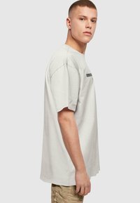 Merchcode HOPE HEAVY OVERSIZE - Triko s potiskem - lightasphalt