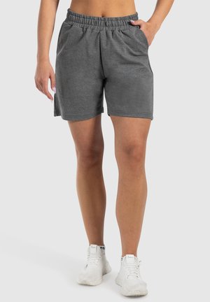 Pantaloni sportivi grigi con vita elastica, due tasche laterali e una vestibilità comoda, realizzati in un tessuto morbido e traspirante.