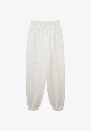 Pantaloni della tuta grigio chiaro con una cintura elasticizzata e polsini elasticizzati con una texture liscia. Progettati per il comfort e l'abbigliamento casual.