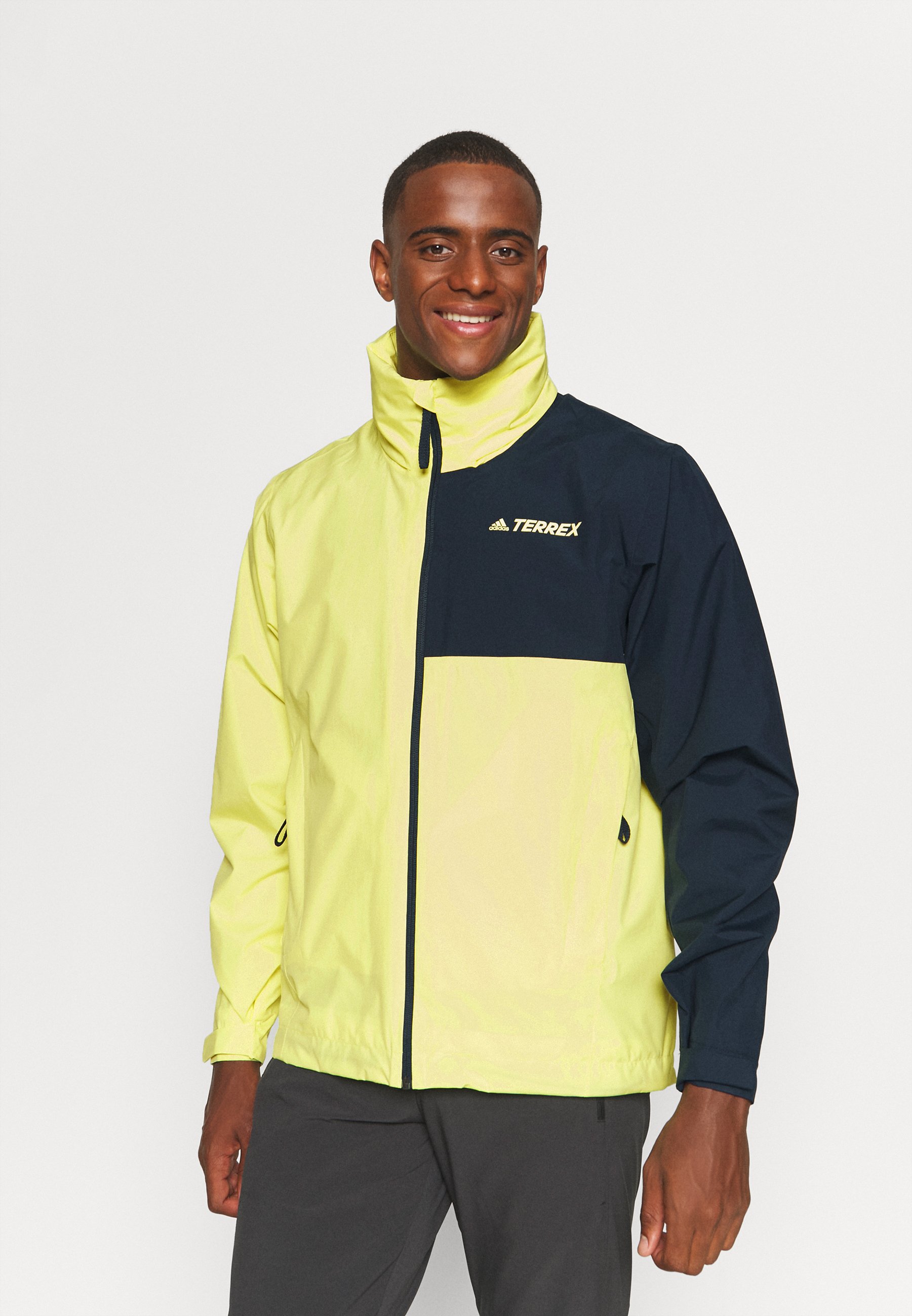 adidas Performance MULTI RAIN JACKET - Outdoorjas - pulse yellow/legend ink/ Geel - Zalando.nl