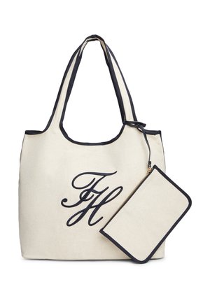 Borsa tote beige con rifiniture e manici neri, caratterizzata dalle iniziali nere "FH", accompagnata da una pochette beige coordinata con cerniera e rifiniture nere.