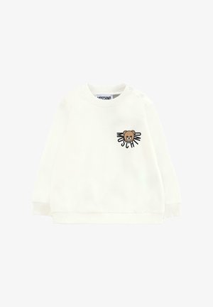 Felpa bianca con polsini e scollatura a coste, caratterizzata da una grafica di un orso bruno e il testo "Moschino" sul petto. Materiale misto cotone.