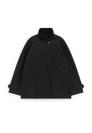 Black high-collar jacket with button closure, long sleeves, two front pockets, and adjustable buttoned cuffs, laid flat on white background.
