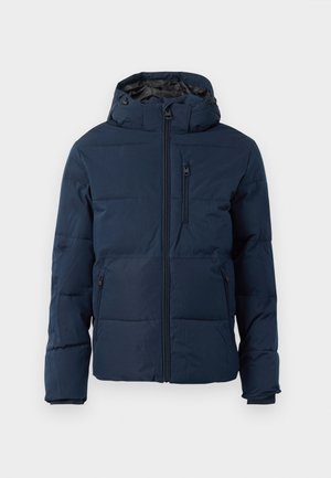 Veste matelassée bleu marine avec fermeture éclair, capuche et poches poitrine. Elle présente des poignets élastiques et une texture extérieure lisse.
