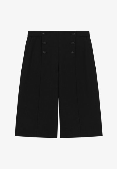 Culottes noires à taille haute, dotées de six boutons à l'avant, de poches latérales et d'une coupe ample pour une bonne circulation de l'air et du confort.