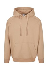 Beige hoodie met een ruime voorzak, verstelbare trekkoorden en geribbelde manchetten. Gemaakt van zachte stof met een ontspannen pasvorm.